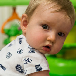 infant looking at camera