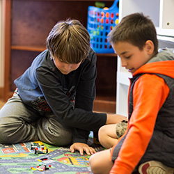 boys working together on school activity